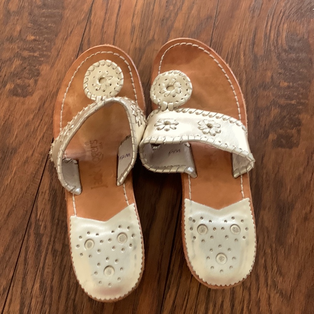 Size 5 Pewter Jack Rogers. Worn but good condition.